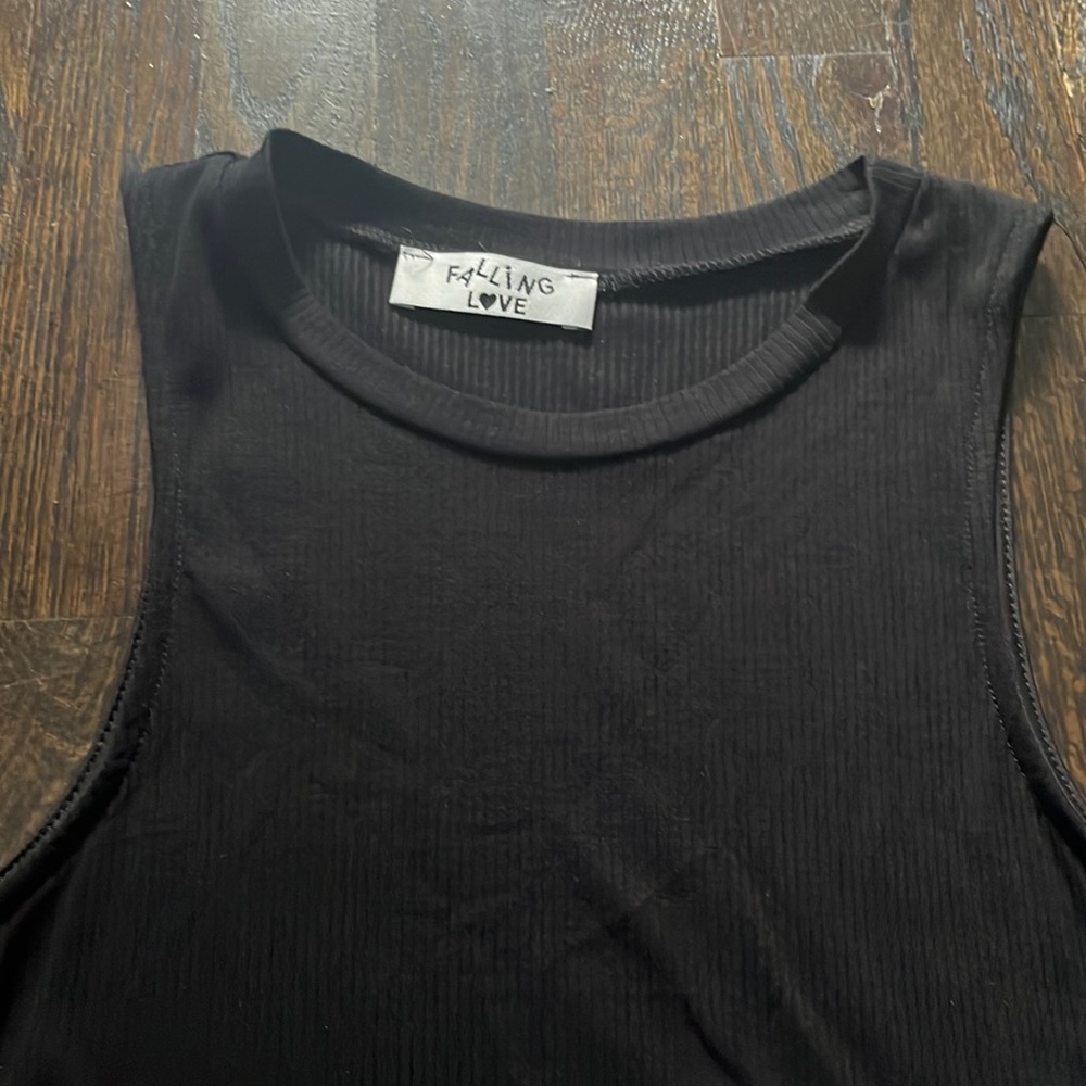 Black woman's bodysuit / new with tags